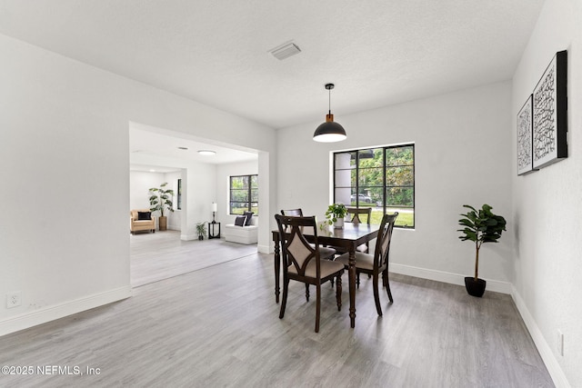 6285 Spring Forest Cir, Jacksonville, FL 32216 - dining room featuring wood finished floors and baseboards