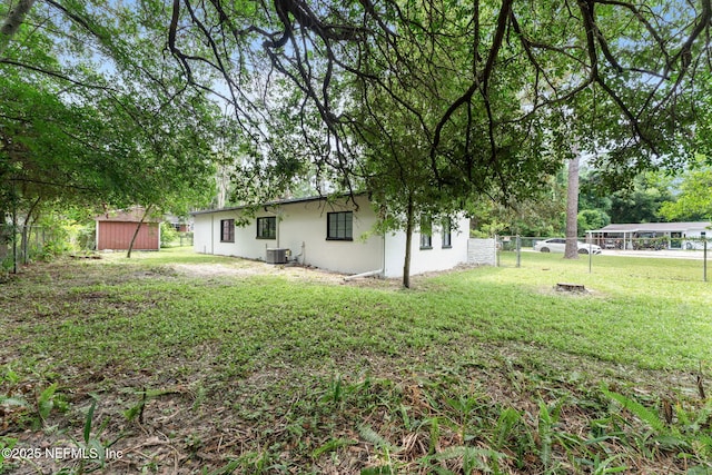 6285 Spring Forest Cir, Jacksonville, FL 32216 - view of yard featuring a storage unit