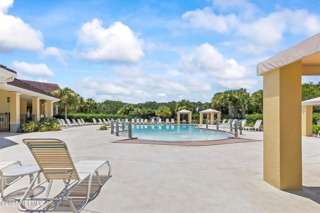 1200 Canopy Walk Ln Unit 1212, Palm Coast, FL 32137 - community pool with a patio