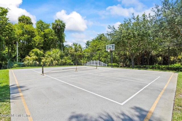 1200 Canopy Walk Ln Unit 1212, Palm Coast, FL 32137 - view of tennis court with community basketball court and view of scattered trees
