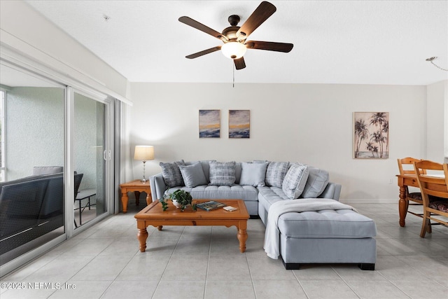 1200 Canopy Walk Ln Unit 1212, Palm Coast, FL 32137 - living area featuring ceiling fan, healthy amount of natural light, and light tile patterned floors