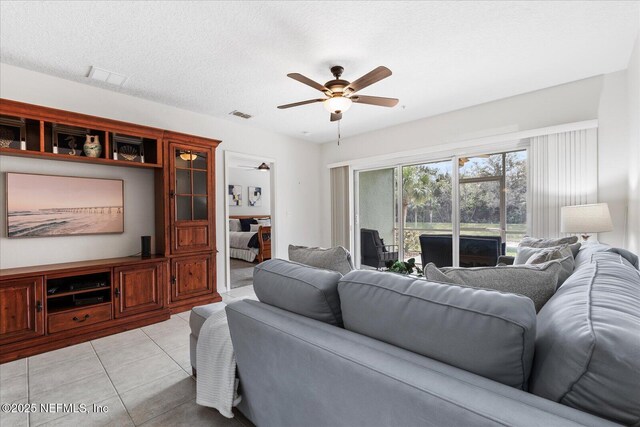 1200 Canopy Walk Ln Unit 1212, Palm Coast, FL 32137 - living area featuring a ceiling fan and light tile patterned floors