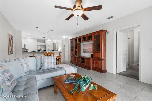 1200 Canopy Walk Ln Unit 1212, Palm Coast, FL 32137 - living room with a ceiling fan and light tile patterned floors