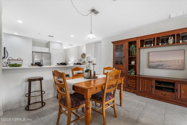 1200 Canopy Walk Ln Unit 1212, Palm Coast, FL 32137 - dining area with light tile patterned floors and recessed lighting