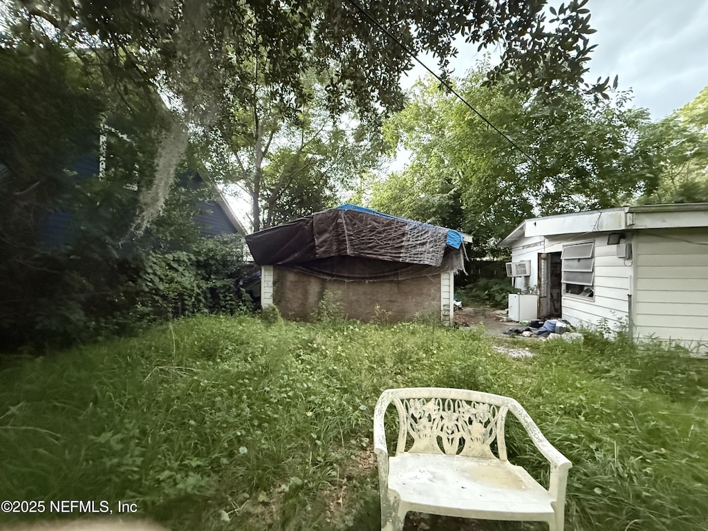 2903 Bratcher Rd, Jacksonville, FL 32224 - view of yard featuring an outdoor structure