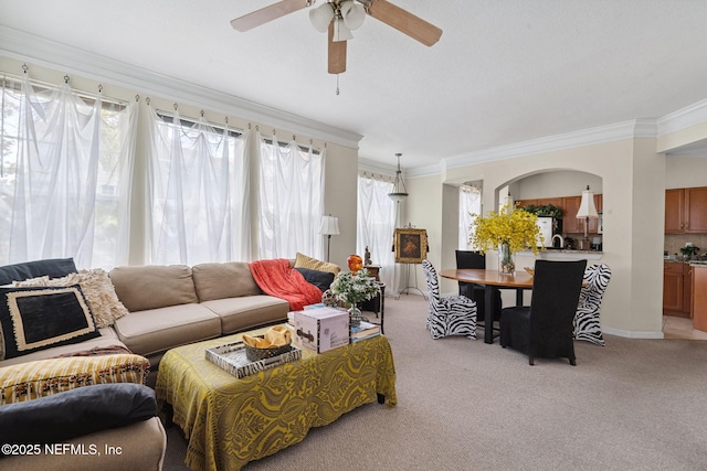 10435 Mid Town Pkwy Unit 265, Jacksonville, FL 32246 - living room featuring crown molding, light carpet, and ceiling fan