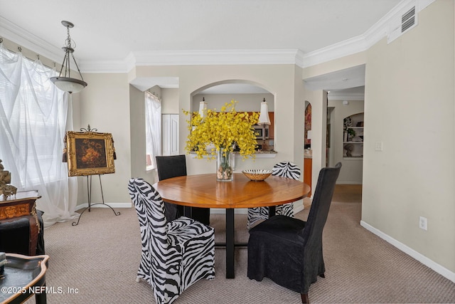 10435 Mid Town Pkwy Unit 265, Jacksonville, FL 32246 - dining area featuring carpet, ornamental molding, and plenty of natural light