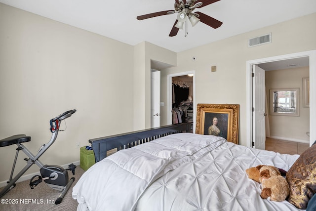 10435 Mid Town Pkwy Unit 265, Jacksonville, FL 32246 - bedroom with ceiling fan, tile patterned flooring, and a spacious closet