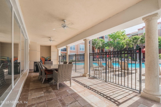 10435 Mid Town Pkwy Unit 265, Jacksonville, FL 32246 - view of patio / terrace with a community pool and a ceiling fan