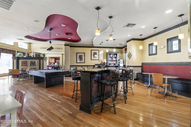 10435 Mid Town Pkwy Unit 265, Jacksonville, FL 32246 - indoor dry bar with light wood finished floors, decorative light fixtures, recessed lighting, ornamental molding, and billiards