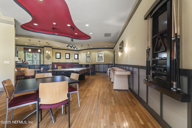 10435 Mid Town Pkwy Unit 265, Jacksonville, FL 32246 - dining room featuring hardwood / wood-style flooring, wainscoting, and recessed lighting