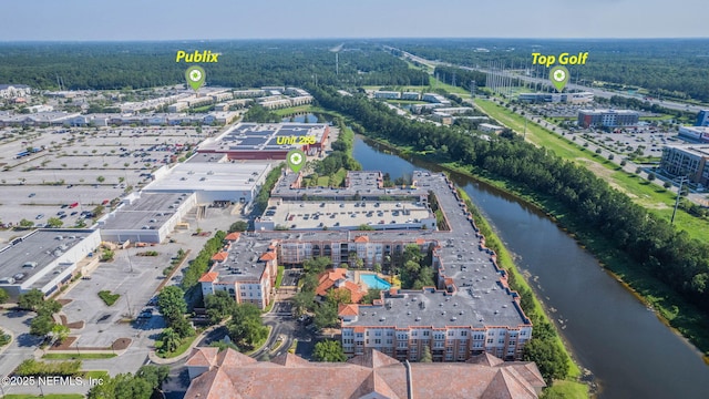 10435 Mid Town Pkwy Unit 265, Jacksonville, FL 32246 - drone / aerial view of a large body of water and a forest
