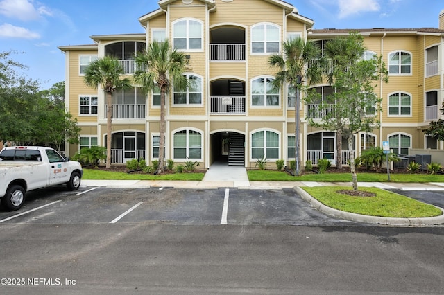130 Old Town Pkwy Unit 2202, Saint Augustine, FL 32084 - view of building exterior with uncovered parking