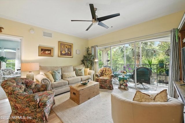 130 Old Town Pkwy Unit 2202, Saint Augustine, FL 32084 - living area featuring ceiling fan, plenty of natural light, crown molding, and wood finished floors