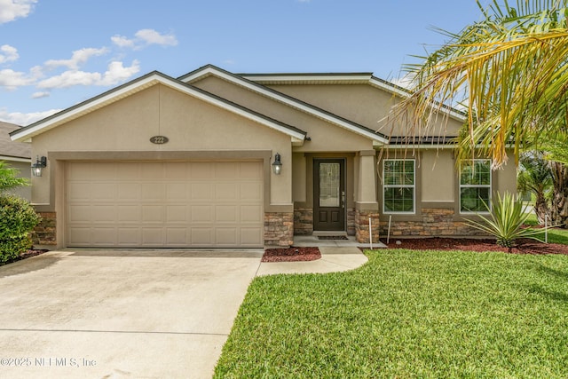 222 Green Turtle Ln, Saint Augustine, FL 32086 - view of front of home featuring stucco siding, stone siding, driveway, a garage, and a front yard