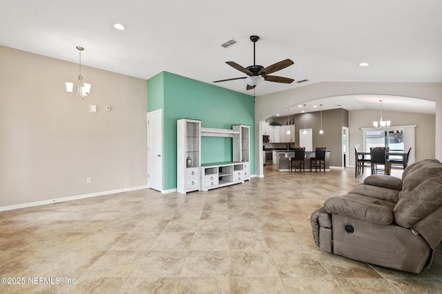 222 Green Turtle Ln, Saint Augustine, FL 32086 - living room with arched walkways, a chandelier, lofted ceiling, ceiling fan, and recessed lighting