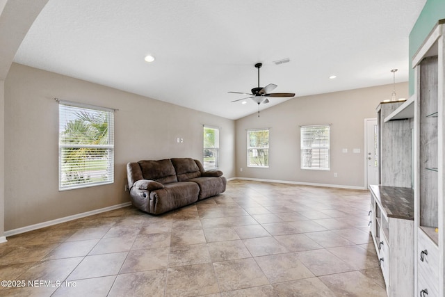 222 Green Turtle Ln, Saint Augustine, FL 32086 - living room featuring a ceiling fan, vaulted ceiling, light tile patterned floors, and recessed lighting