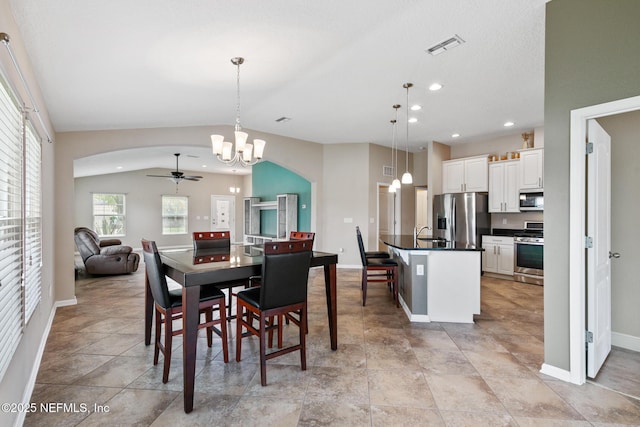 222 Green Turtle Ln, Saint Augustine, FL 32086 - dining space with arched walkways, a ceiling fan, a chandelier, and recessed lighting
