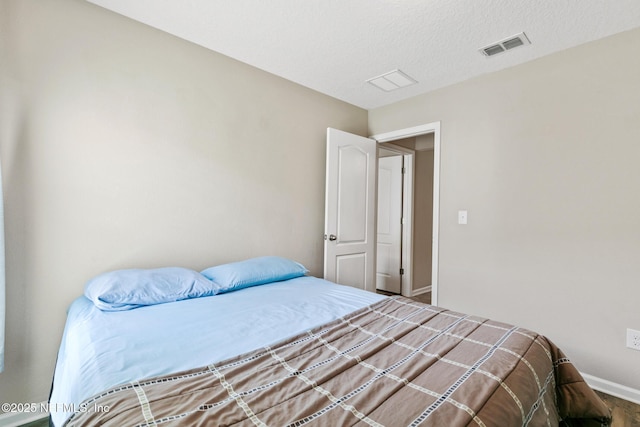 222 Green Turtle Ln, Saint Augustine, FL 32086 - bedroom with baseboards and a textured ceiling