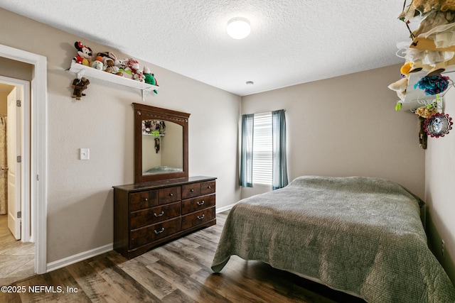 222 Green Turtle Ln, Saint Augustine, FL 32086 - bedroom featuring wood finished floors and a textured ceiling