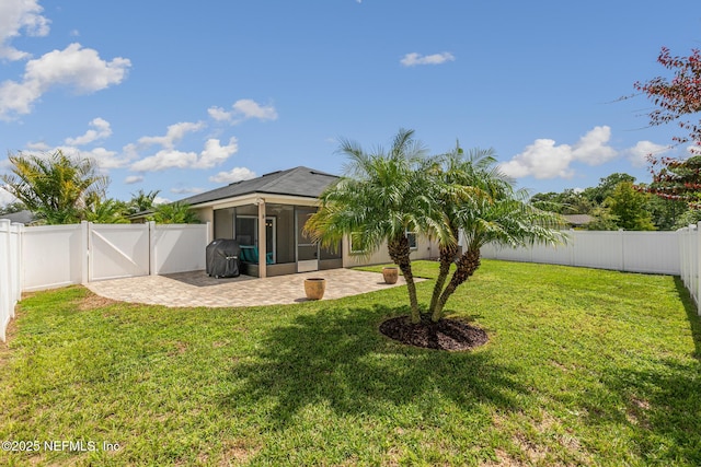 222 Green Turtle Ln, Saint Augustine, FL 32086 - fenced backyard with a sunroom, a patio, and a gate