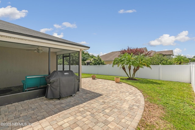 222 Green Turtle Ln, Saint Augustine, FL 32086 - fenced backyard featuring grilling area, a patio, and ceiling fan