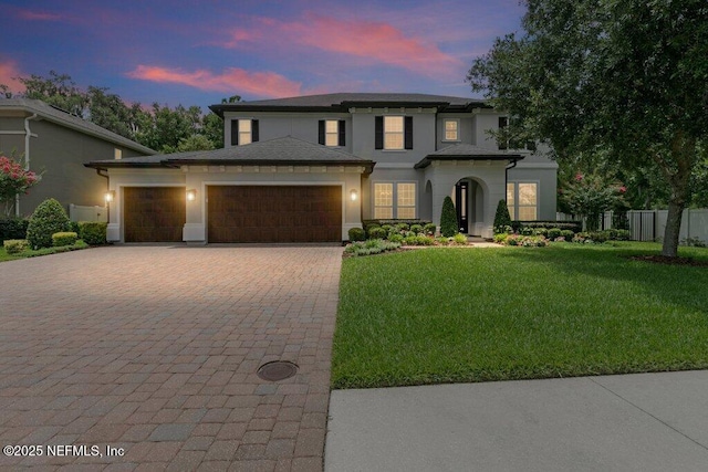 26 Traveler Palm Ct, Ponte Vedra Beach, FL 32082 - view of front facade with a garage, decorative driveway, and stucco siding