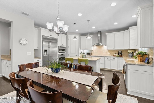 26 Traveler Palm Ct, Ponte Vedra Beach, FL 32082 - dining space featuring recessed lighting and dark wood-style flooring