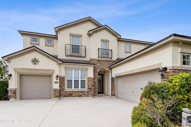 1306 Warbler Way, Middleburg, FL 32068 - view of front facade featuring a balcony, stone siding, and stucco siding