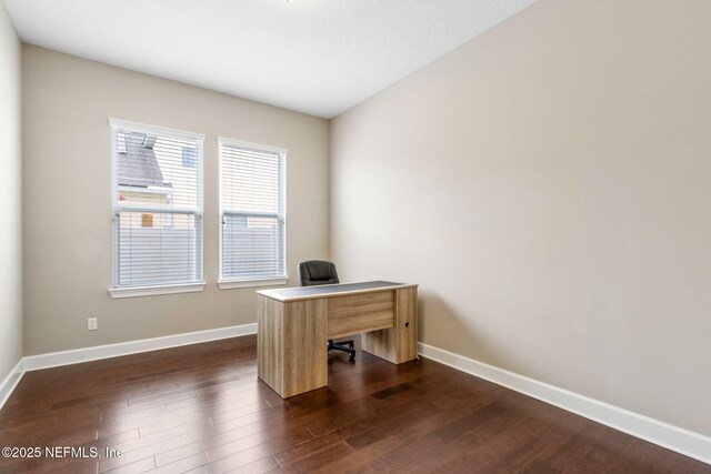 1306 Warbler Way, Middleburg, FL 32068 - unfurnished office with baseboards and dark wood-style flooring