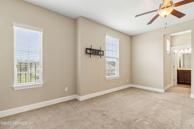 1306 Warbler Way, Middleburg, FL 32068 - spare room with light colored carpet and ceiling fan