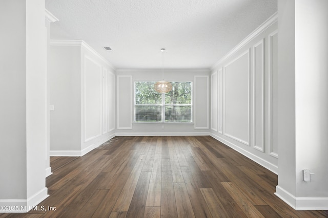 12490 Tropic Dr, Jacksonville, FL 32225 - spare room with a decorative wall, dark wood-style flooring, and ornamental molding