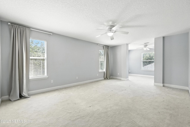 12490 Tropic Dr, Jacksonville, FL 32225 - spare room featuring a ceiling fan, a textured ceiling, and carpet
