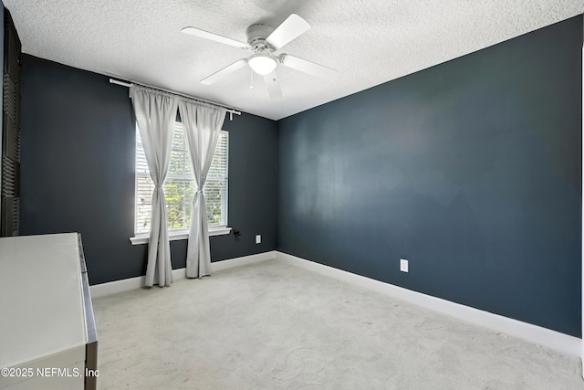 12490 Tropic Dr, Jacksonville, FL 32225 - unfurnished room with a ceiling fan, a textured ceiling, and carpet floors