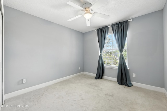 12490 Tropic Dr, Jacksonville, FL 32225 - carpeted empty room featuring ceiling fan and a textured ceiling