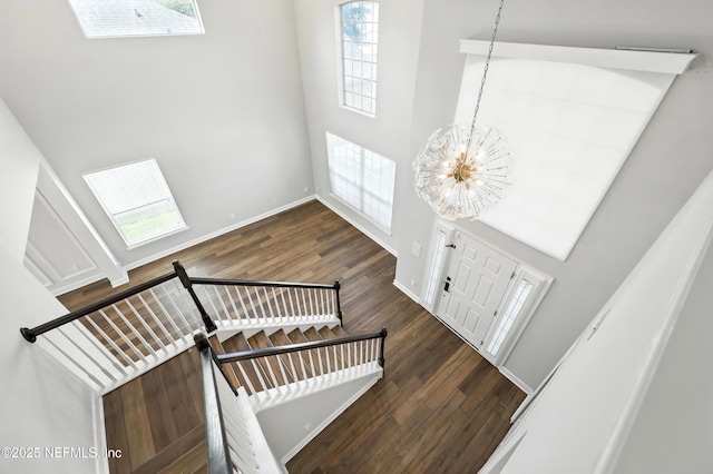 12490 Tropic Dr, Jacksonville, FL 32225 - entrance foyer with a towering ceiling, wood finished floors, and a chandelier
