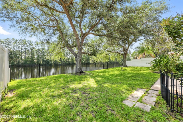 12490 Tropic Dr, Jacksonville, FL 32225 - fenced backyard featuring a water view