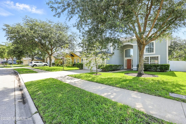 12490 Tropic Dr, Jacksonville, FL 32225 - view of front of house featuring driveway, an attached garage, and stucco siding