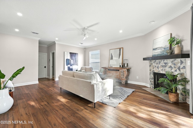 12490 Tropic Dr, Jacksonville, FL 32225 - living area featuring ceiling fan, hardwood / wood-style flooring, recessed lighting, a fireplace with flush hearth, and ornamental molding