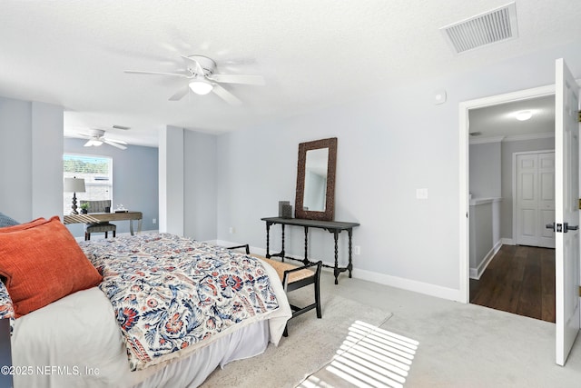12490 Tropic Dr, Jacksonville, FL 32225 - carpeted bedroom featuring ceiling fan and crown molding