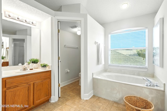 12490 Tropic Dr, Jacksonville, FL 32225 - bathroom featuring a textured ceiling, vanity, a garden tub, and a shower with door