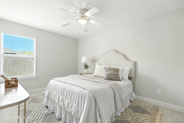 12490 Tropic Dr, Jacksonville, FL 32225 - carpeted bedroom featuring baseboards and a ceiling fan