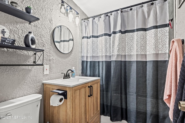5414 Cleveland Rd, Jacksonville, FL 32209 - full bath with a textured wall, vanity, and curtained shower