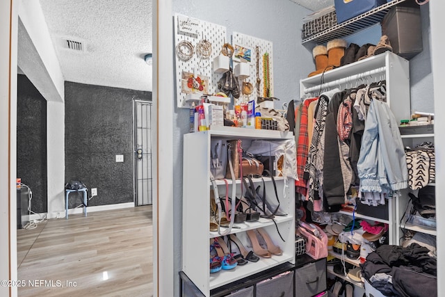 5414 Cleveland Rd, Jacksonville, FL 32209 - walk in closet with wood finished floors