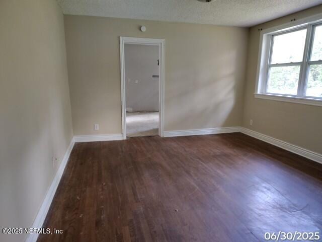 7228 Zona Ave, Jacksonville, FL 32211 - unfurnished room featuring wood finished floors and a textured ceiling