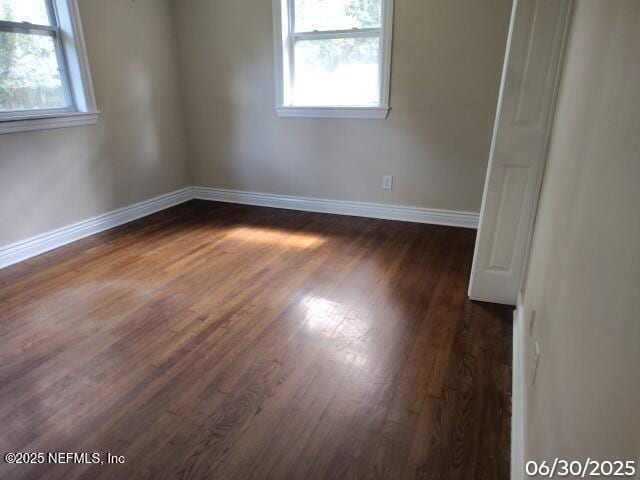 7228 Zona Ave, Jacksonville, FL 32211 - spare room with dark wood-type flooring and plenty of natural light