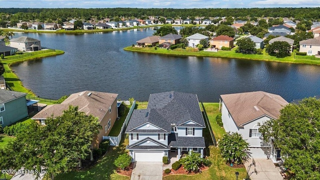 11598 Wynnfield Lakes Cir, Jacksonville, FL 32246 - aerial perspective of suburban area featuring a nearby body of water