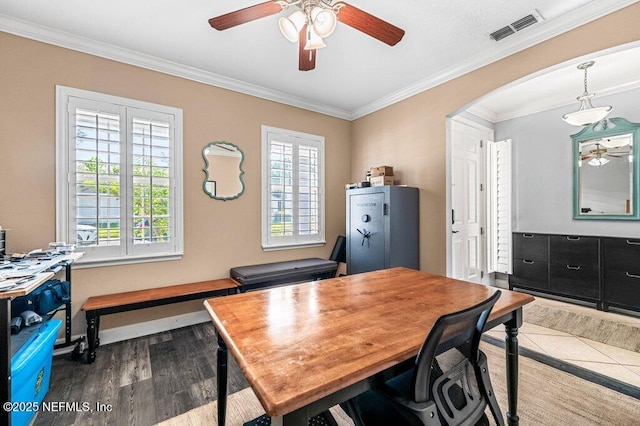 11598 Wynnfield Lakes Cir, Jacksonville, FL 32246 - home office with ceiling fan, arched walkways, ornamental molding, and wood finished floors