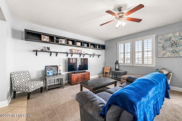 11598 Wynnfield Lakes Cir, Jacksonville, FL 32246 - living area featuring baseboards and a ceiling fan