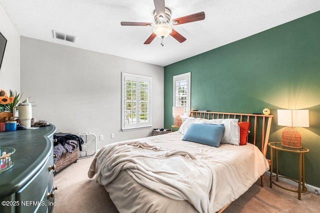 11598 Wynnfield Lakes Cir, Jacksonville, FL 32246 - carpeted bedroom with a ceiling fan